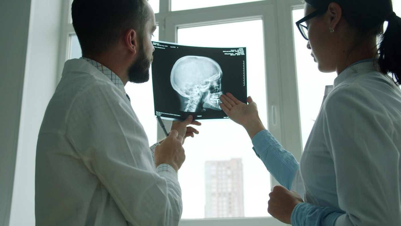 Clinicians reviewing a scan